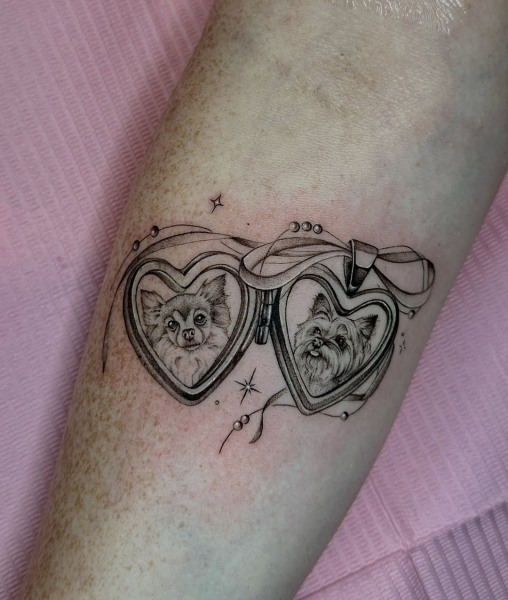 2026 tattoo trends cute locket tattoo with dog portraits on arm